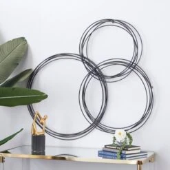 Metal Plate Overlapping Ring Wall Decor - CosmoLiving By Cosmopolitan -Home Improvement Store GUEST 00e22674 bea2 45ec bc11 44126051a918