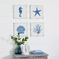 Set Of 4 Metal Sea Horse Speckled Wall Decors With Starfish Shell And Coral Designs Cream - Olivia & May -Home Improvement Store GUEST 224fcb19 35d1 42ea a972 f7e9e12e0abb
