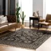 5'x8' Gretel Geometric Motif Jute Tassel Area Rug Black - NuLOOM